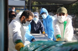 غسل و کفن فوت‌شدگان کرونایی توسط جهادگران طلبه